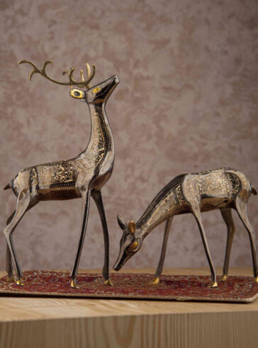 Bronze statue of two yellow deer