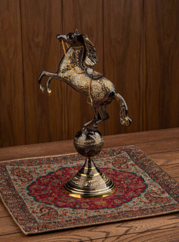 Bronze statue of a horse on a sphere figurine