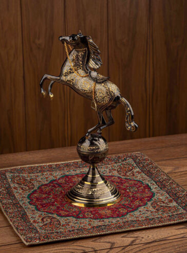 Bronze statue of a horse on a sphere figurine