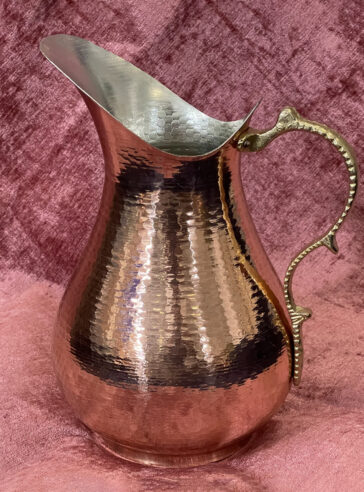 Copper pitcher with patterned handle