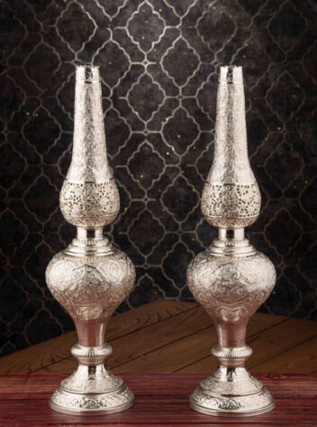 Traditional carved silver lamp