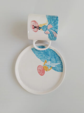 A set of ceramic cup and tray of sea girl