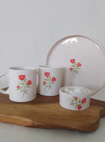 A set of ceramic Home Coffee Cups , trays, and sugar bowl of Tulip