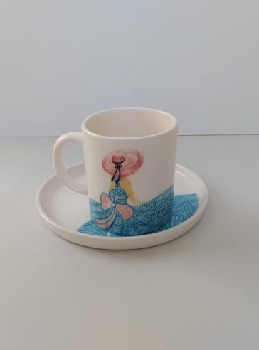 A set of ceramic cup and tray of sea girl