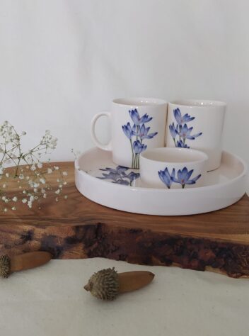 A set of cups, trays, and sugar bowl of sufferon flower