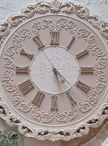 Wall clock with chocolate embossed flower design