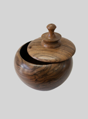 Round sugar bowl made of walnut wood