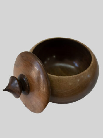 Round sugar bowl made of walnut wood