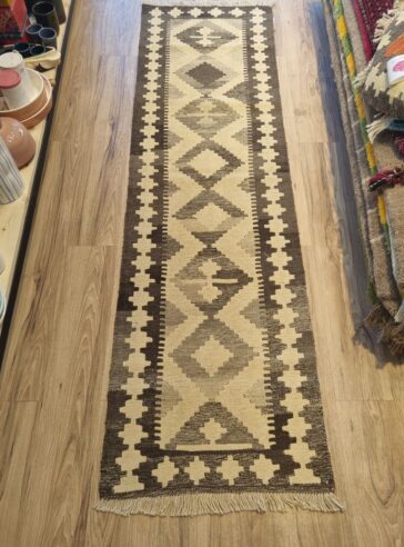 One-color long wool runner rug, hand knotte by Turkman for the corridor