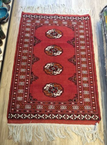 Turkmen tribal red rug with Mari Gol design