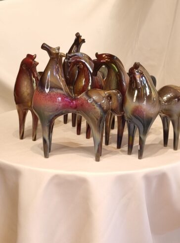 Ceramic horse with luster glaze in different forms