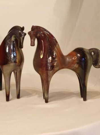 Ceramic horse with luster glaze in different forms