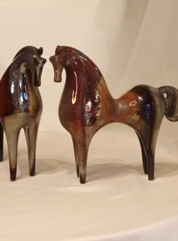 Ceramic horse with luster glaze in different forms